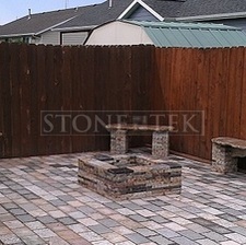 Mixed Blend pavers with Garden benches and square fire pit.